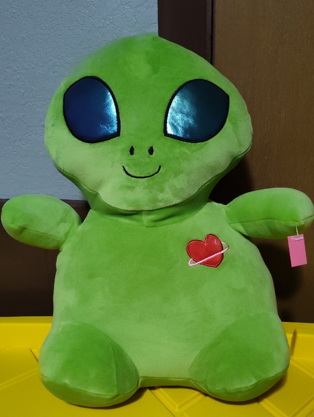 Green Alien Plush with Shiny Blue Eyes and Red Heart Patch